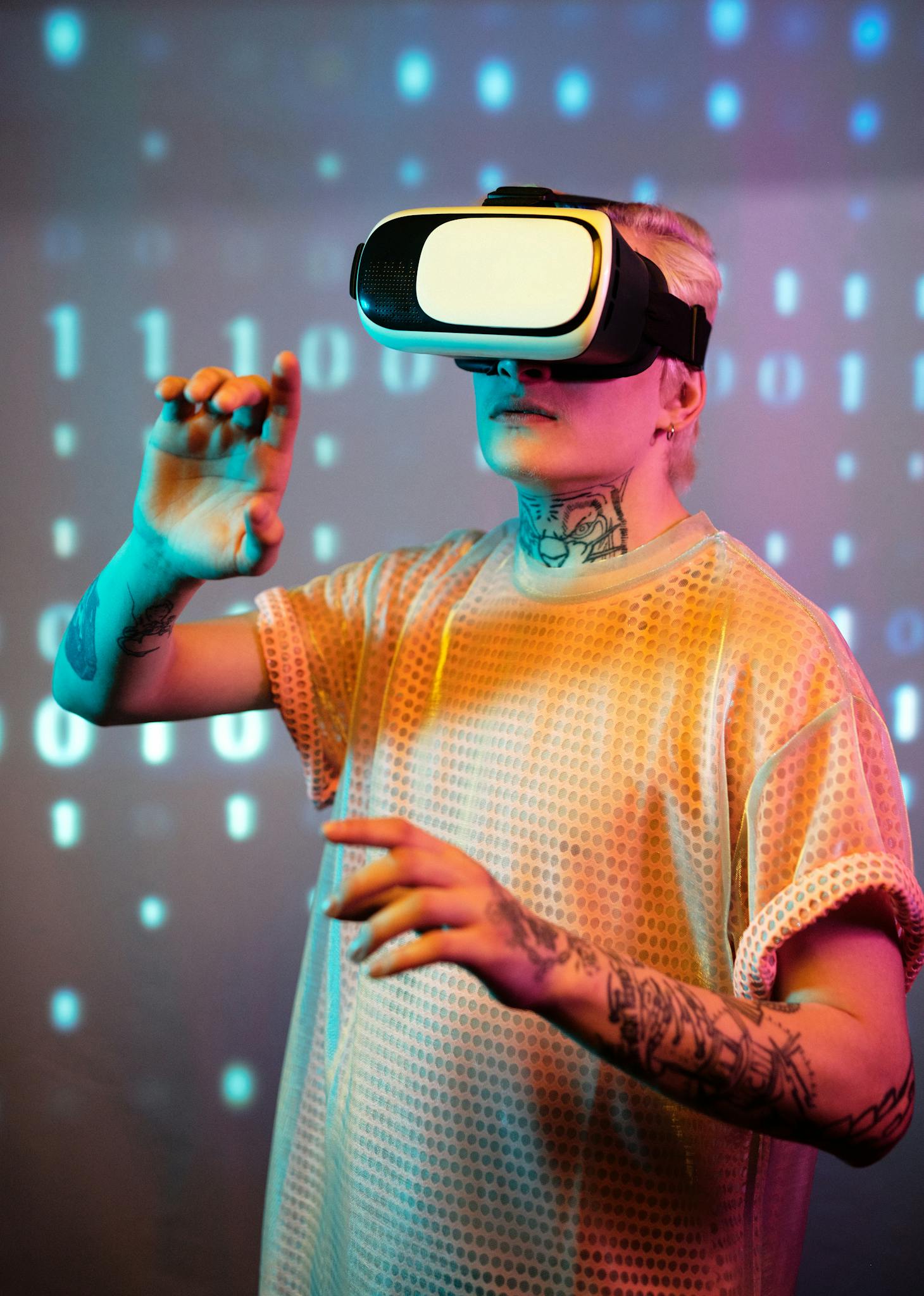 Man with tattoos wearing a VR headset in a virtual reality environment.